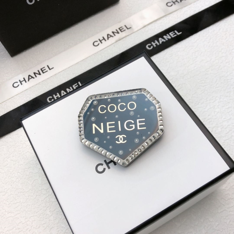 Ch*el brooches